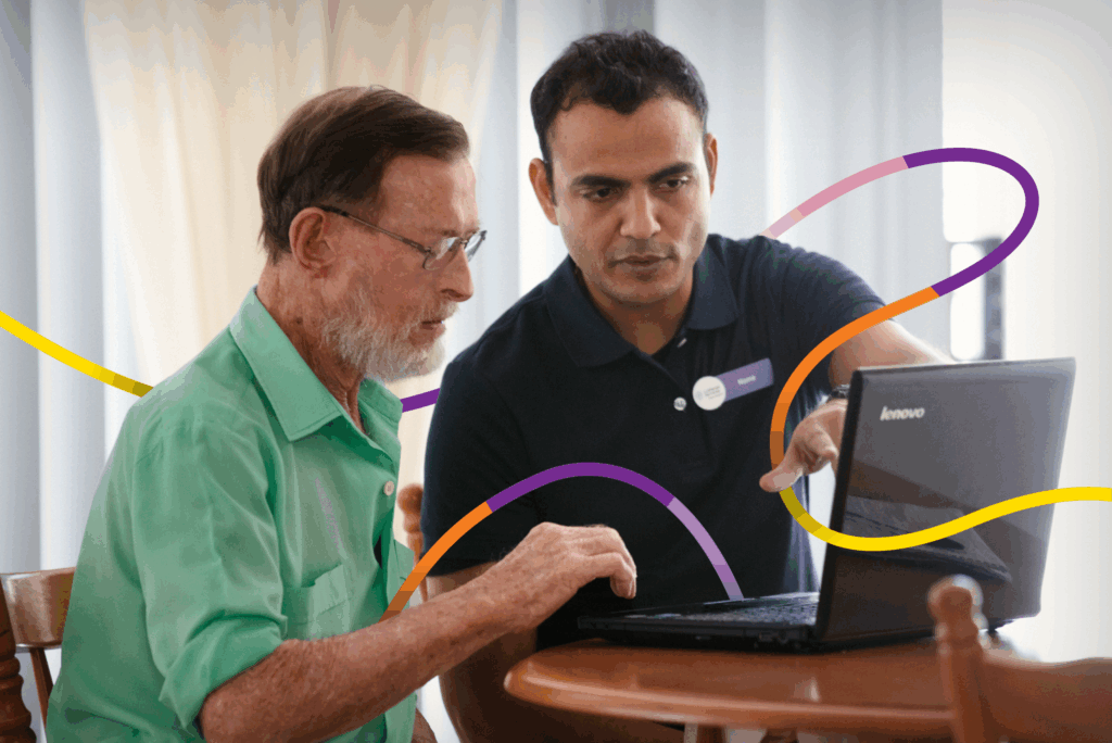 Support worker explaining CHSP options to client and carer